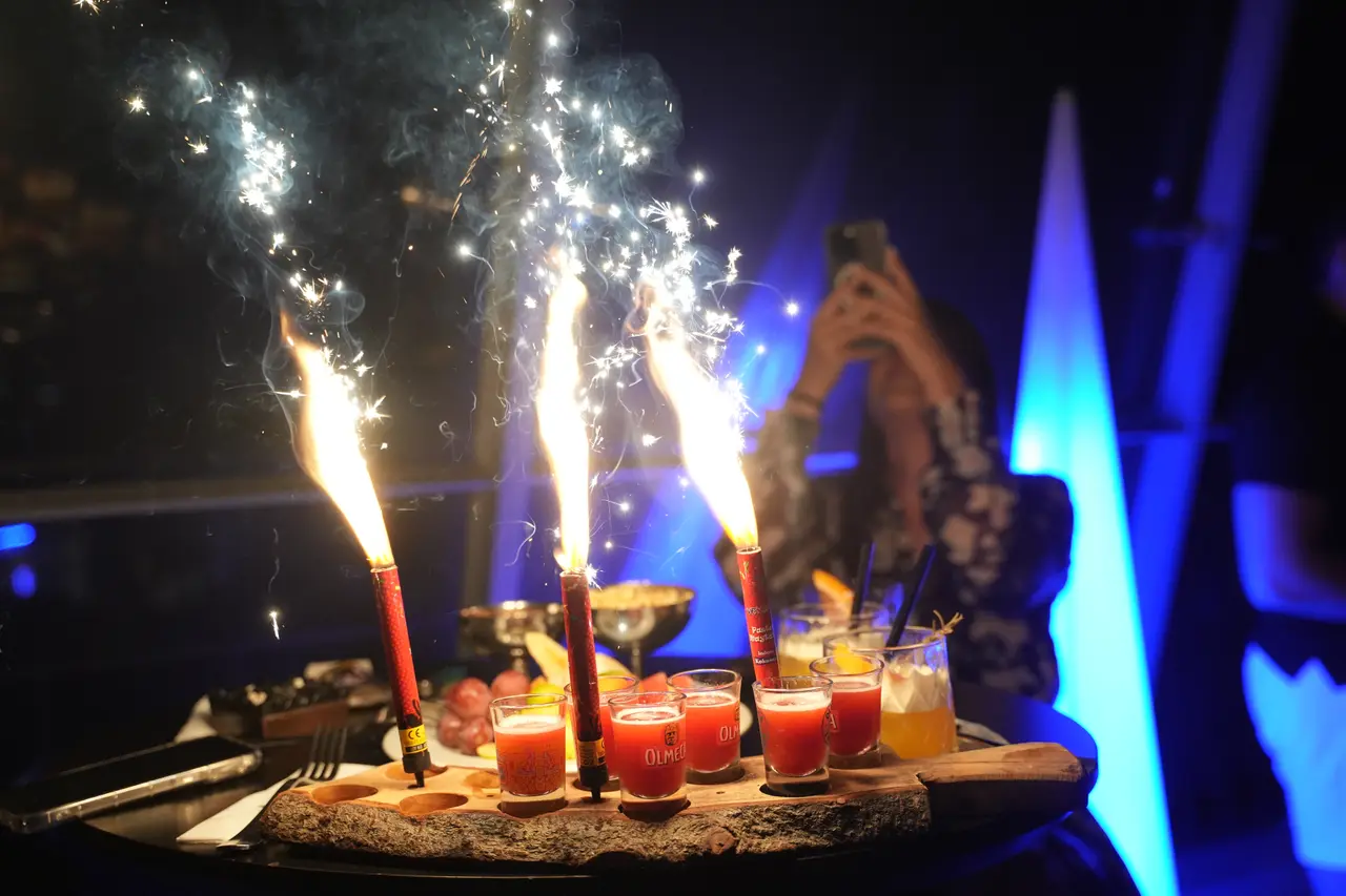 Sparklers lighting up a table celebration