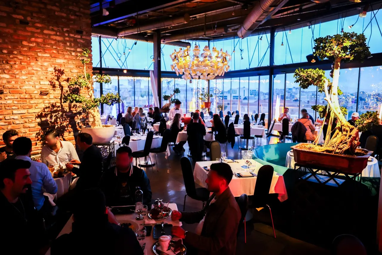 Brick walls, bonsai trees and floor-to-ceiling windows in the 360 Istanbul restaurant